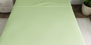 Sage green custom bed sheets top view