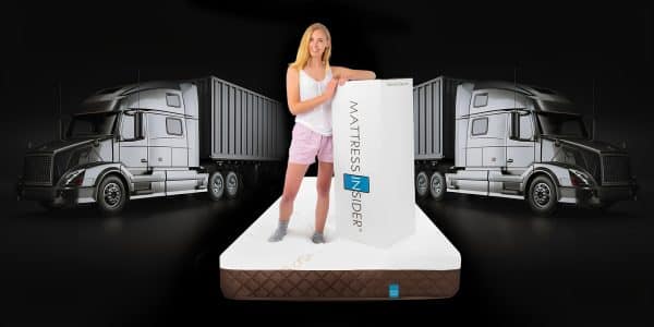 Lady standing on the luxury in front of a truck