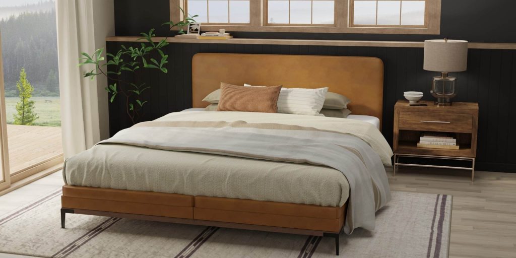 Alberta King bed mattress on upholstered frame with forest view