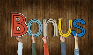 People holding colorful BONUS letters promotional graphic