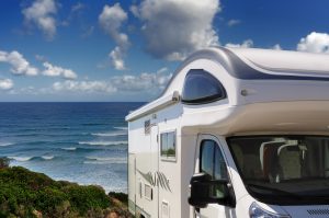 RV camper parked beachside ocean view